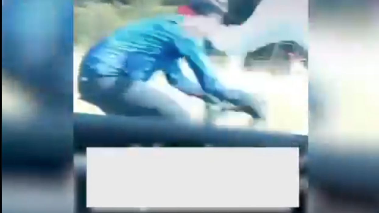 <p>John was pushed off his bike</p>
