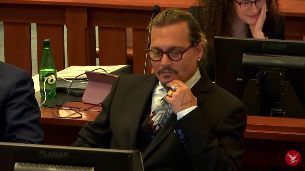 Johnny Depp laughs in court as nurse is questioned over his 'penis' texts to her