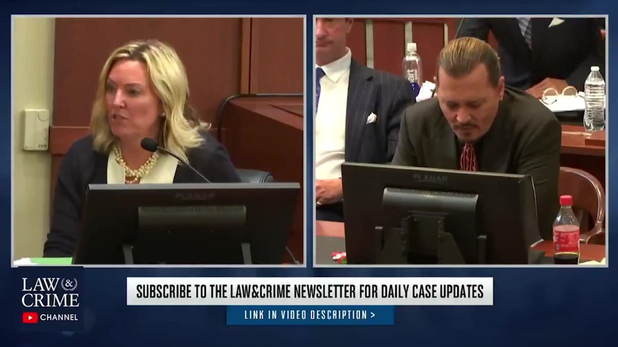 Amber Heard just took the stand and Johnny Depp couldn't even look at her