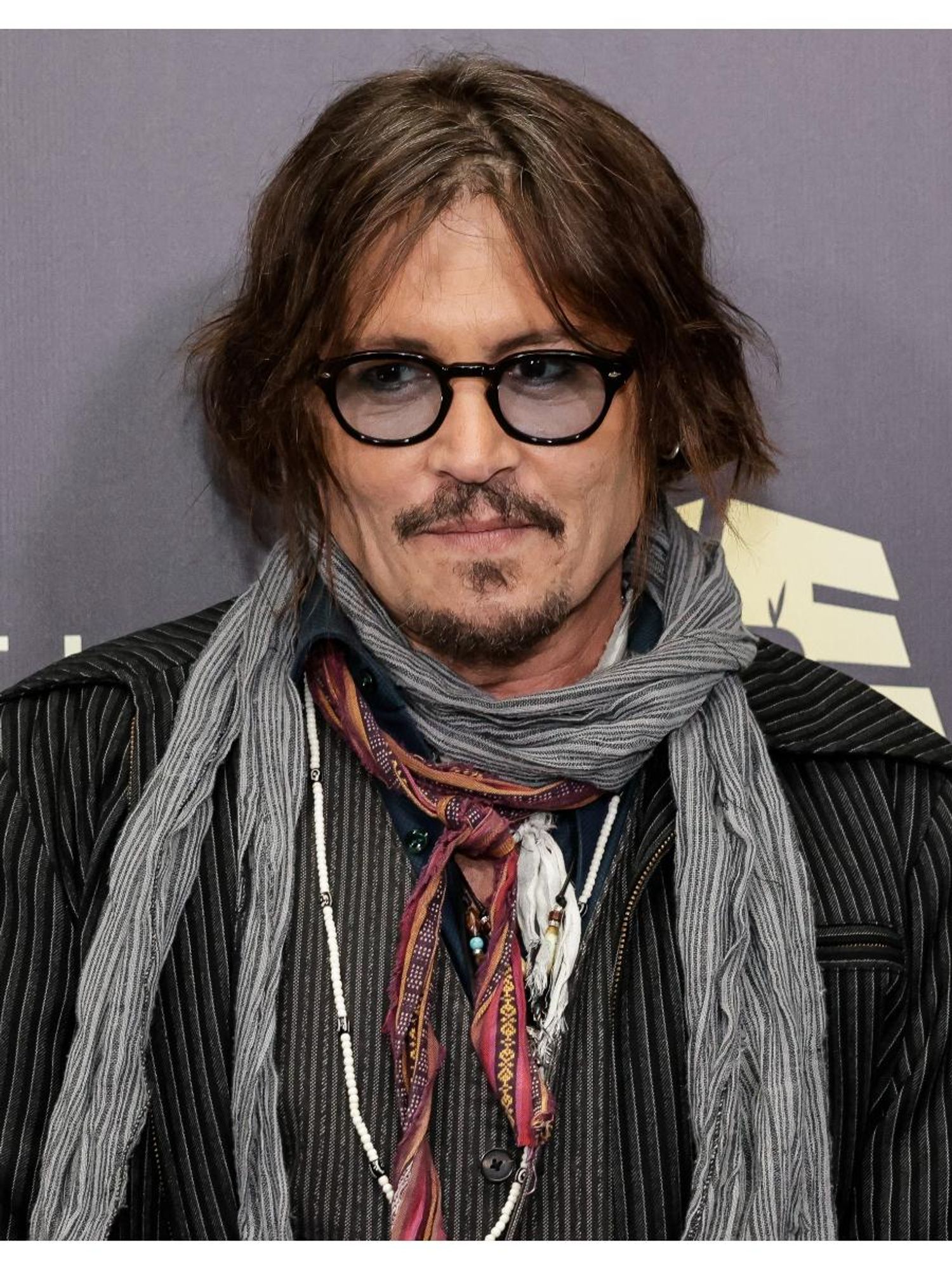 Johnny Depp's shaved his beard off and looks unrecognisable