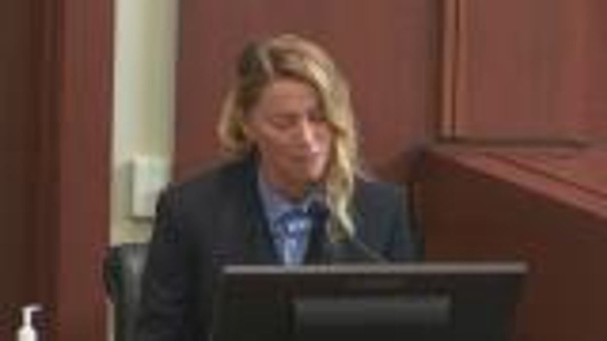 Amber Heard says Johnny Depp slapped her for laughing at his tattoo