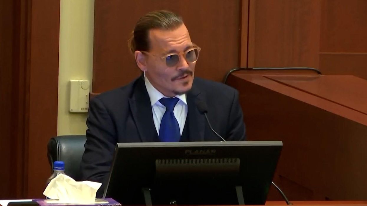 Johnny Depp fans are convinced they've spotted a lookalike of Amber Heard's lawyer in 2013 video of the actor
