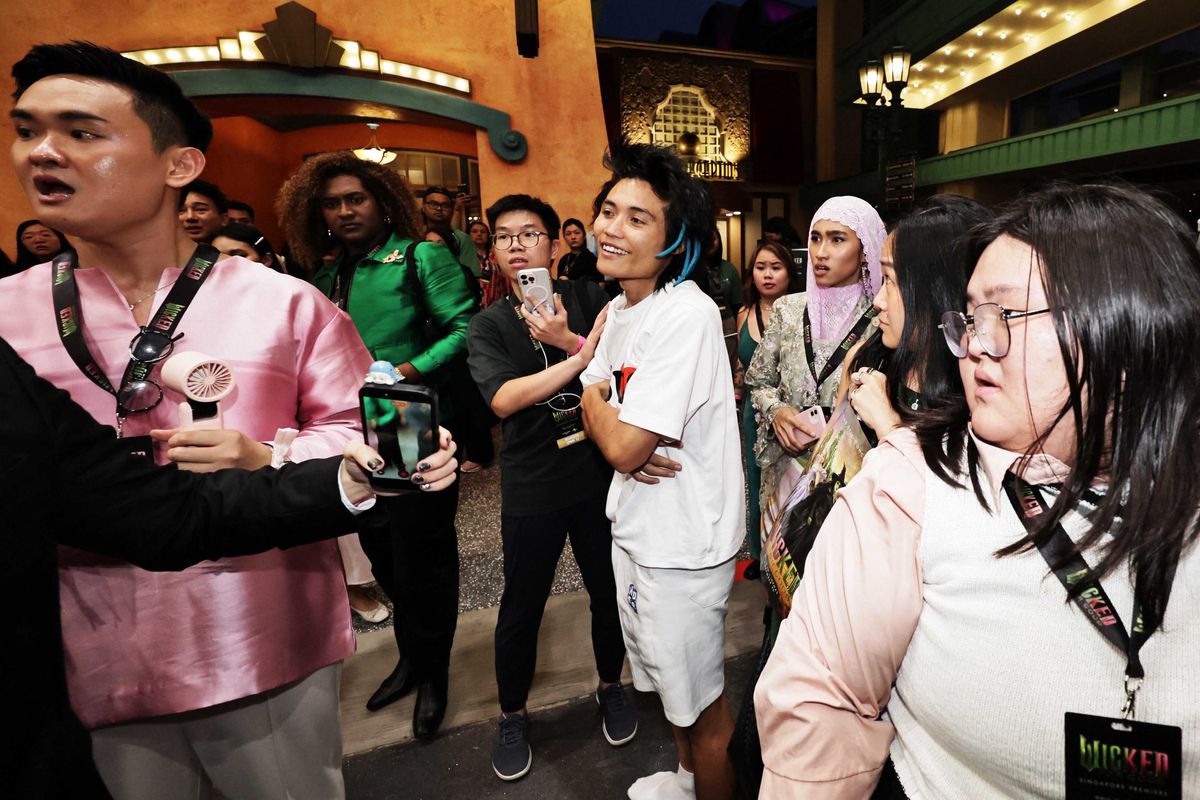 Johnson Wen, also known as 'Pyjama Man', at the Wicked: For Good premiere in Singapore.