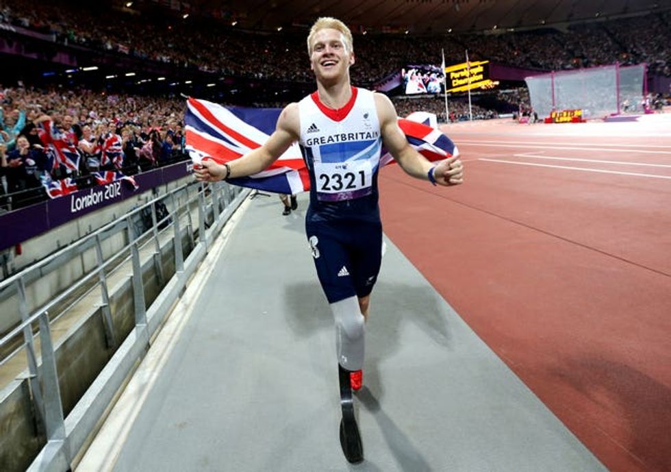 Jonnie Peacock celebrates winning the men\u2019s 100m T44 category final at London 2012
