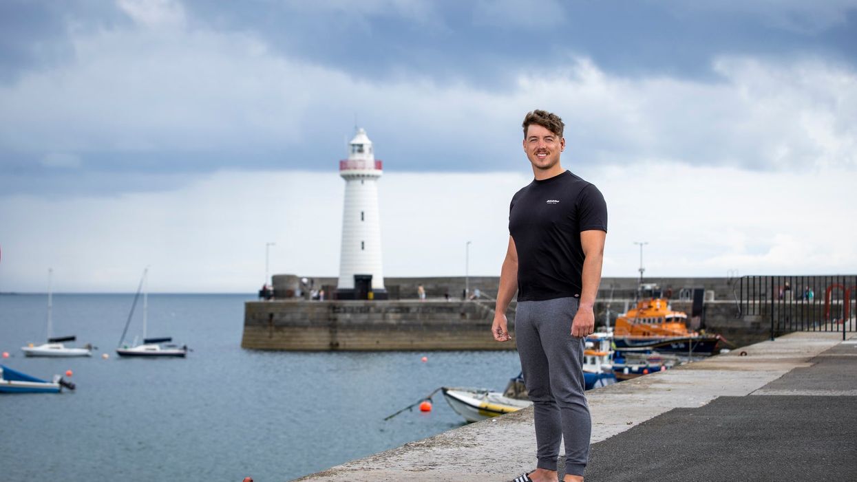 Jordan Leckey at Donaghadee Harbour in Northern Ireland, close to where he set off swimming to Portpatrick in Scotland (Liam McBurney/PA)