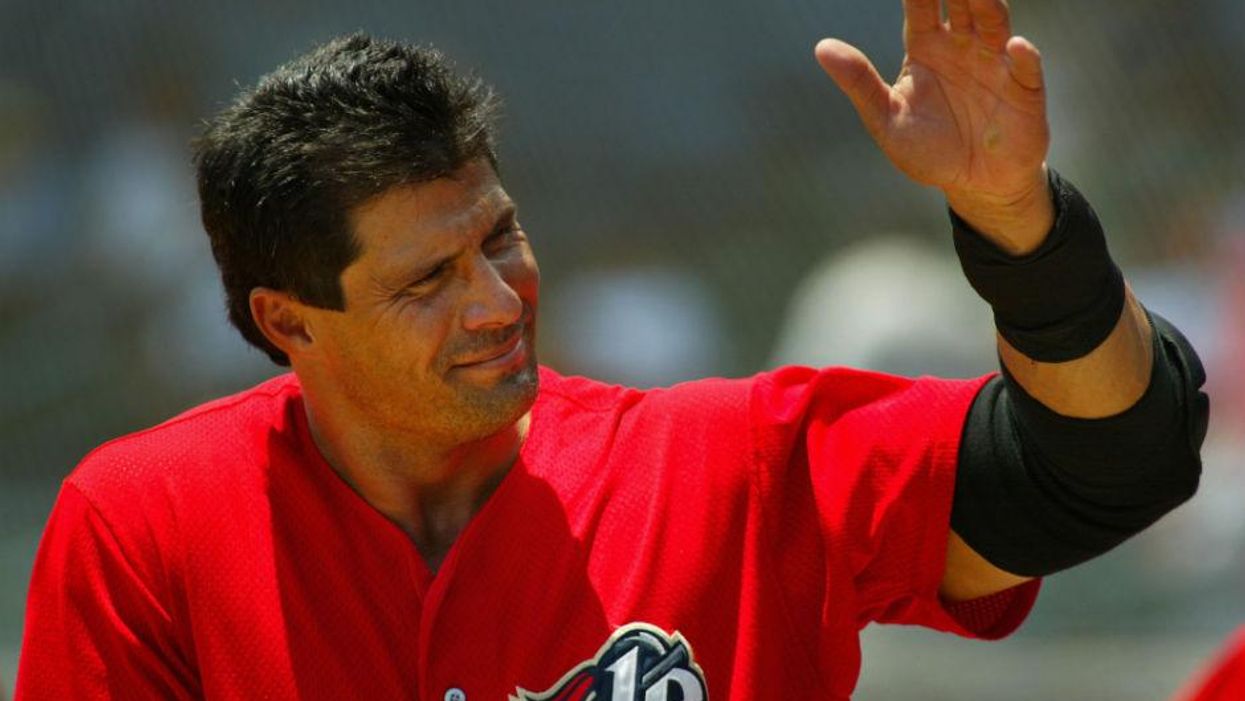Jose Canseco pictured in 2006, fingers intact