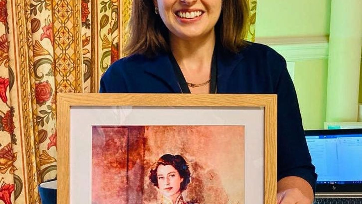 <p>Joy Morrissey wants everyone to be as happy as she is when presented with a portrait of the Queen</p>