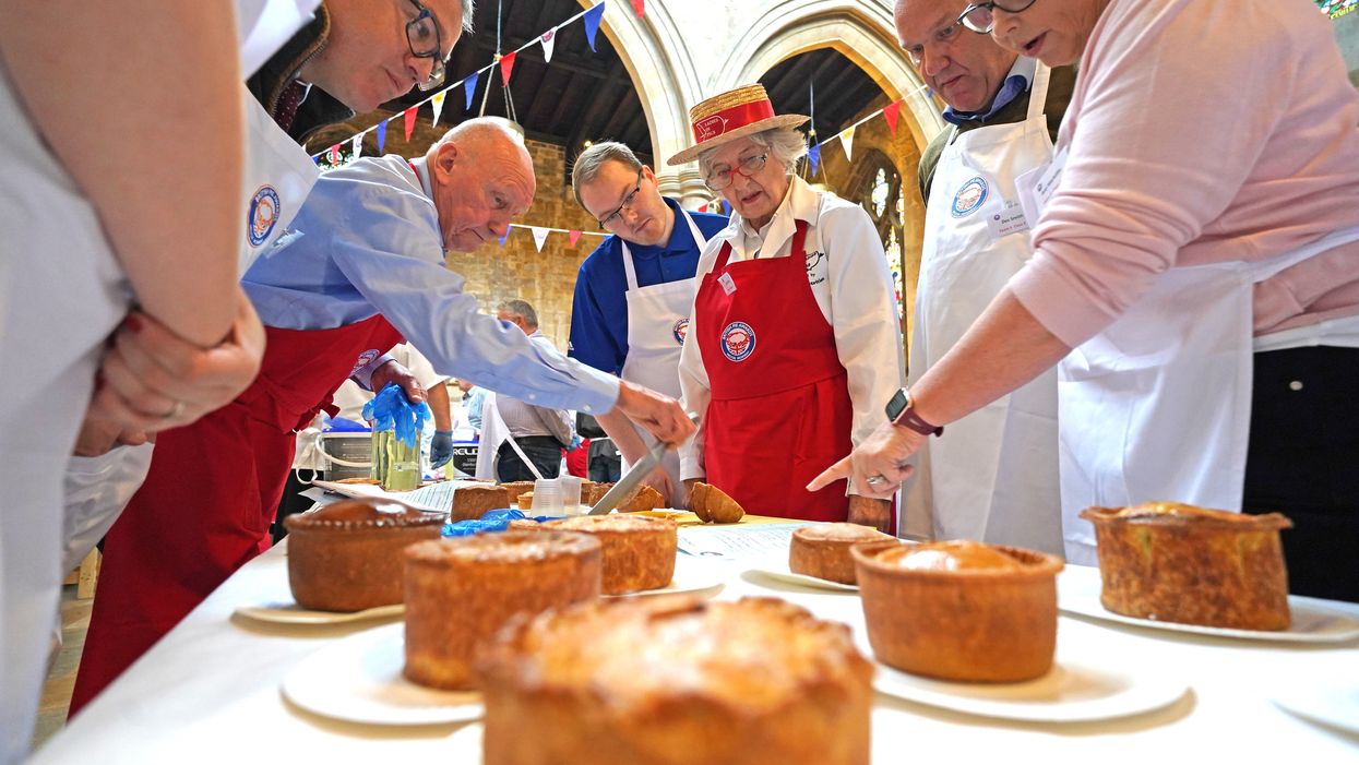 Judging is under way at the Annual British Pie Awards at St Mary’s Church in Melton Mowbray, Leicestershire (Jacob King/PA)
