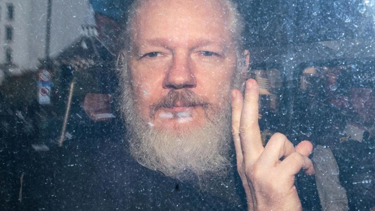 Julian Assange arrives at Westminster Magistrates court on 11 April