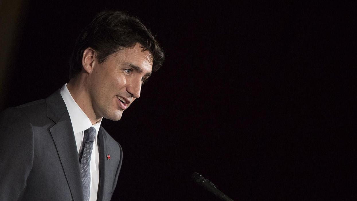 Justin Trudeau in a rare photo with his top on