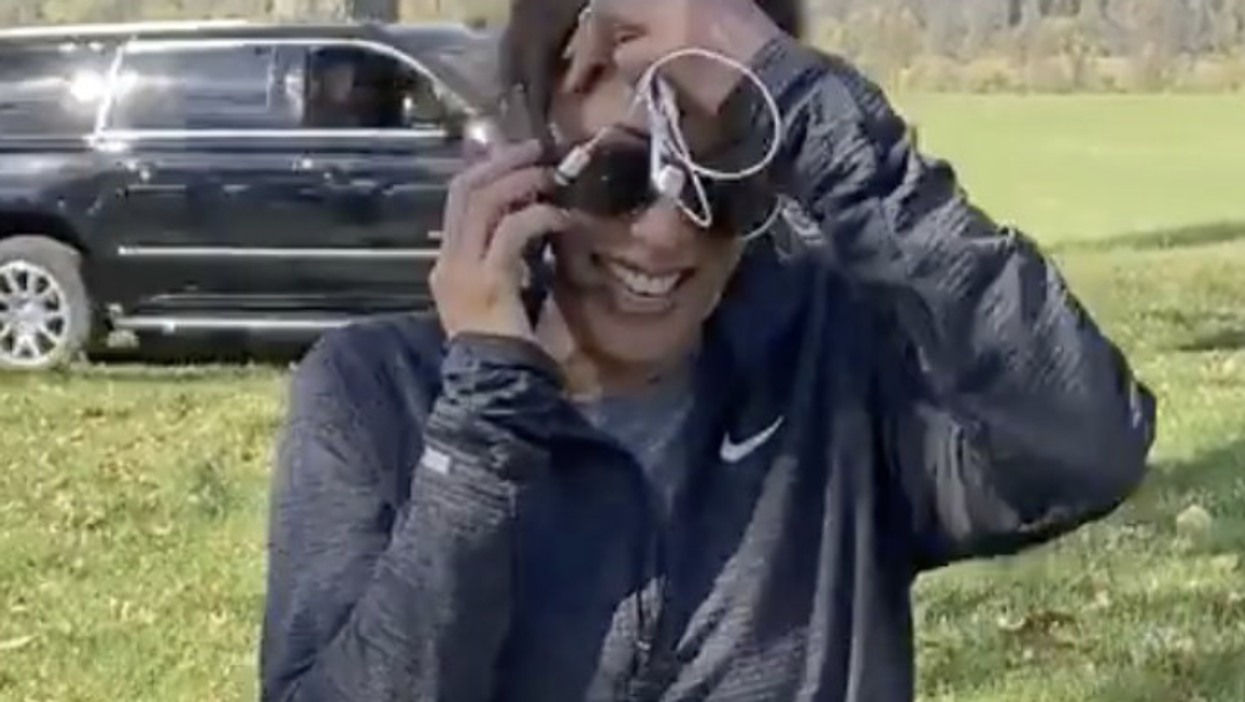 <p>Kamala Harris with her wired headphones</p>