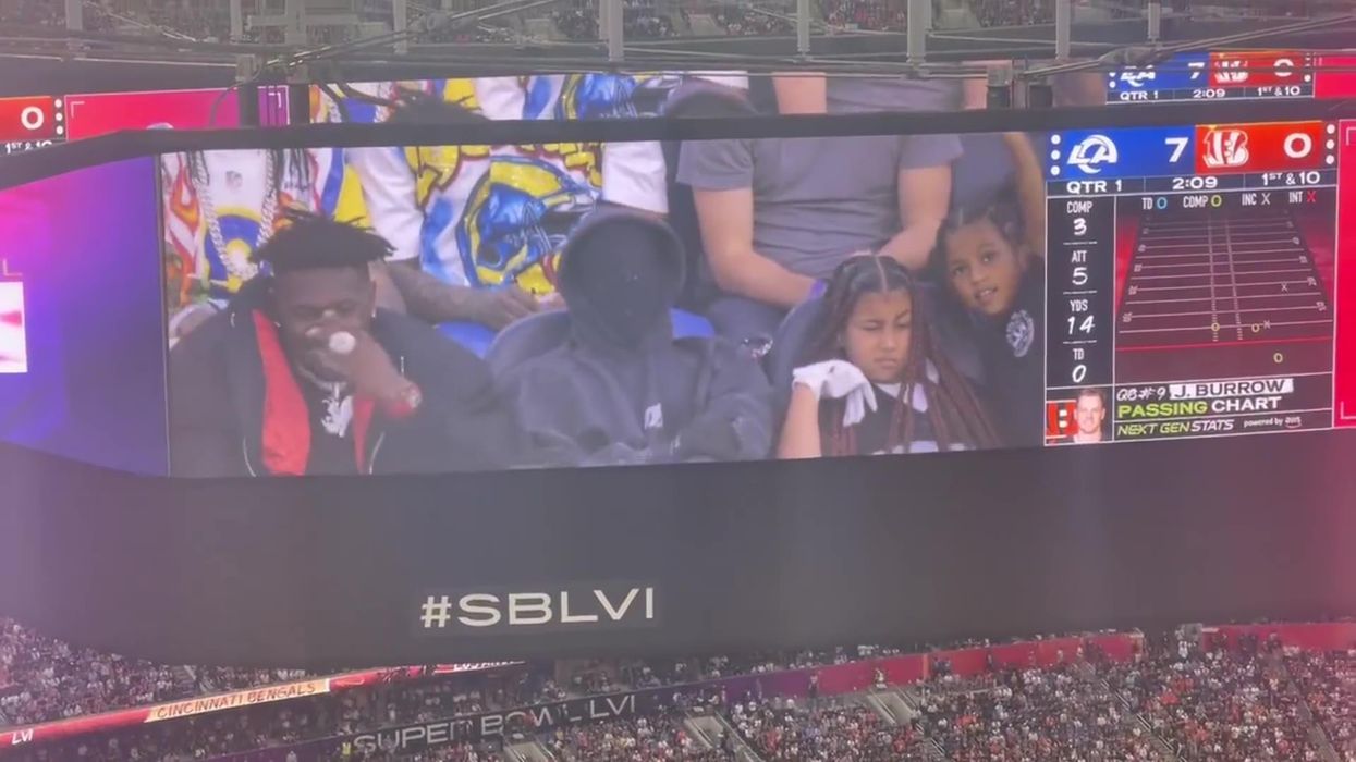 Kanye West is booed by crowd as he attends Super Bowl with his kids