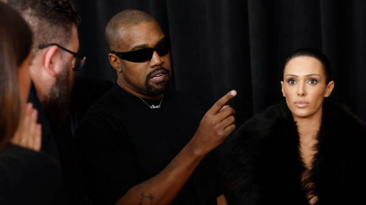 Kanye West sports KKK hood in 'most unhinged' interview yet