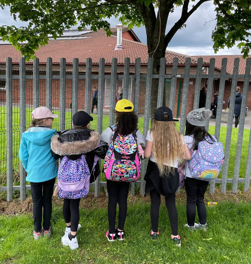 Kara's friends wearing caps