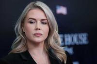 Karoline Leavitt, a white woman with long blonde hair.