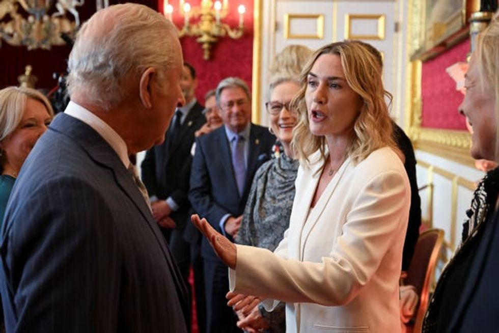 Kate Winslet chatting to the King at St James's Palace