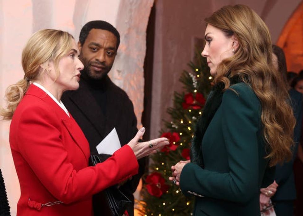 Kate Winslet speaking to the Princess of Wales, while Chiwetel Ejiofor looks on