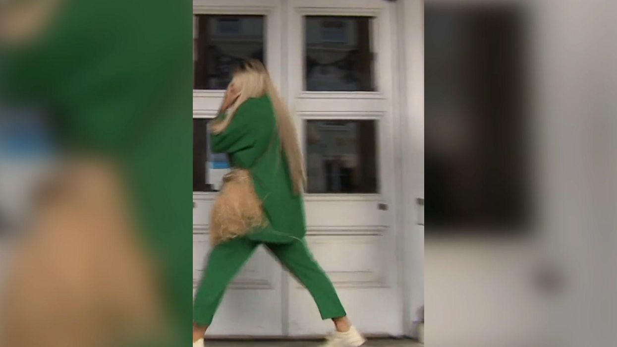 Katie Price has been pictured in high heel crocs