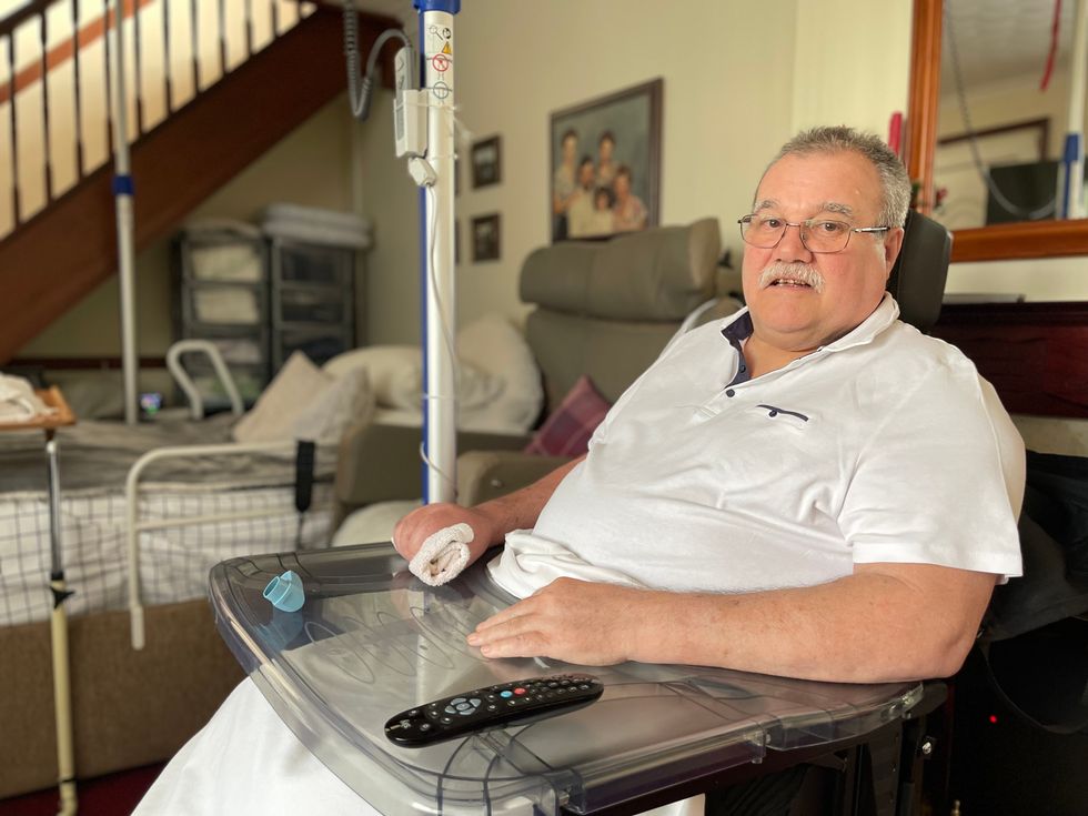 Keith Parry was left sleeping under the stairs of his home following a stroke (Band of Builders/PA)