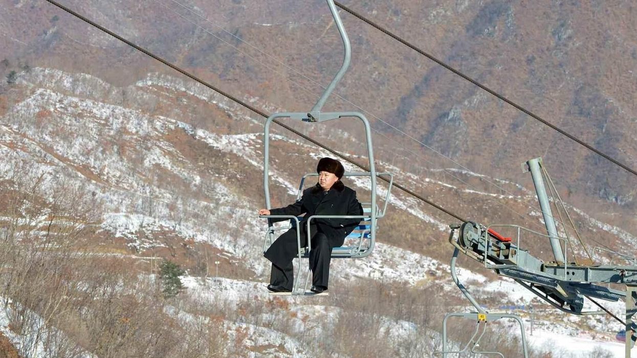 Kim Jong Un rides a ski lift during his inspection tour at the Masikryong resort, near Wonsan, North Korea. Picture: