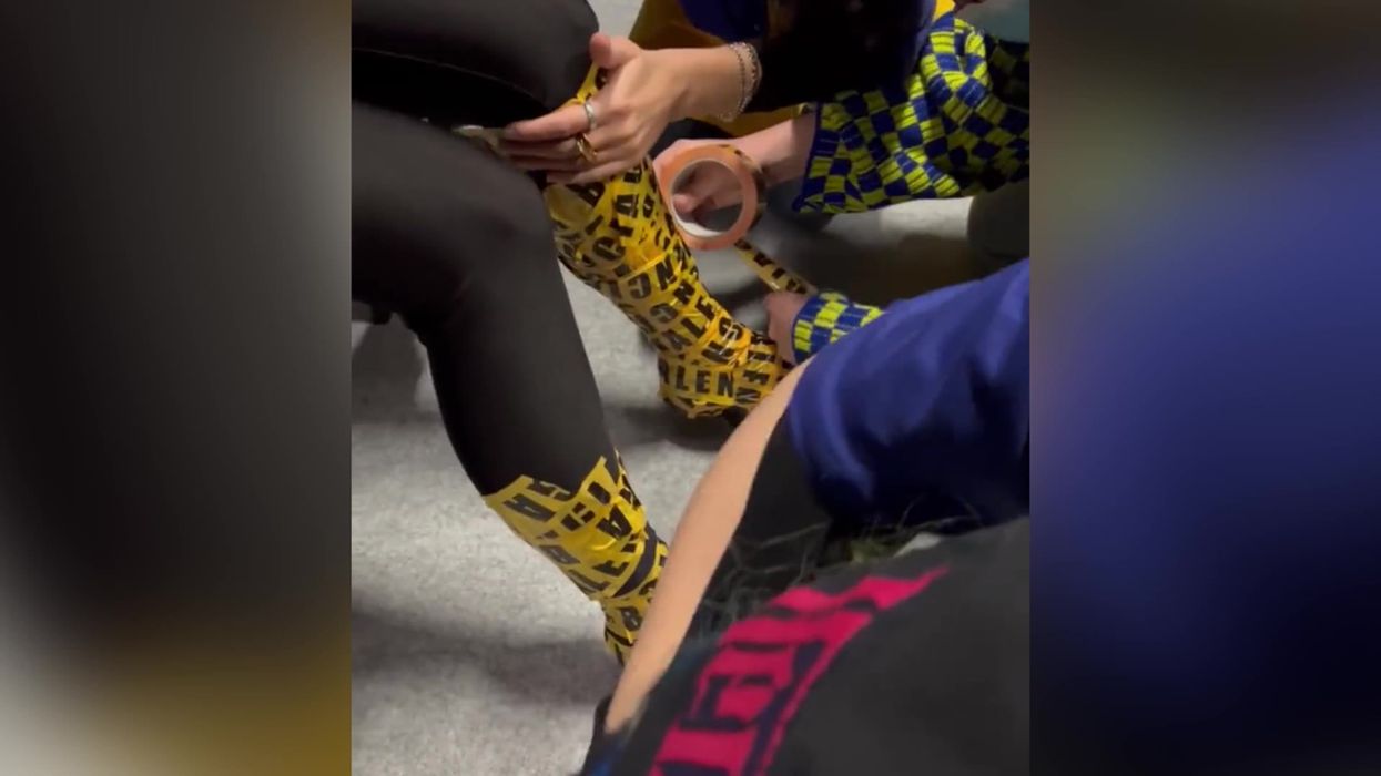 Kim Kardashian gets wrapped in layers of tape for Balenciaga show