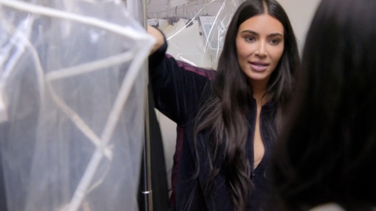 Kim Kardashian strikes a pose in her cavernous closet