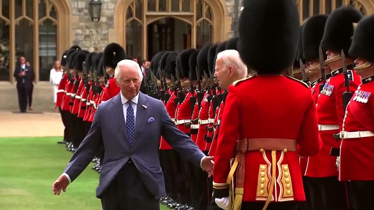 Awkward moment King Charles loses cool over Biden’s chat with Windsor guard