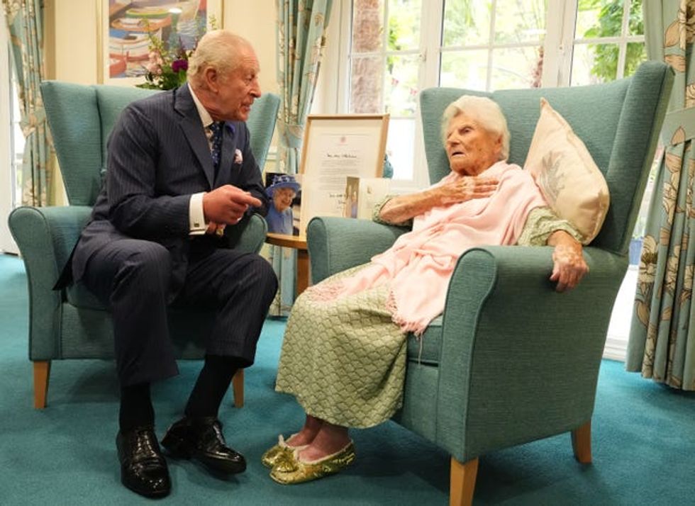 King Charles III meets world\u2019s oldest person