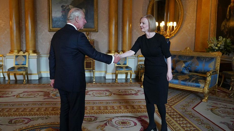 Liz Truss's curtsy to King Charles has become an instant meme | indy100