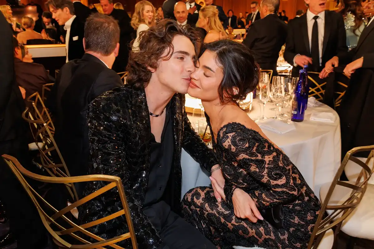 Kylie Jenner and Timothee Chalamet share a kiss at the Golden Globes