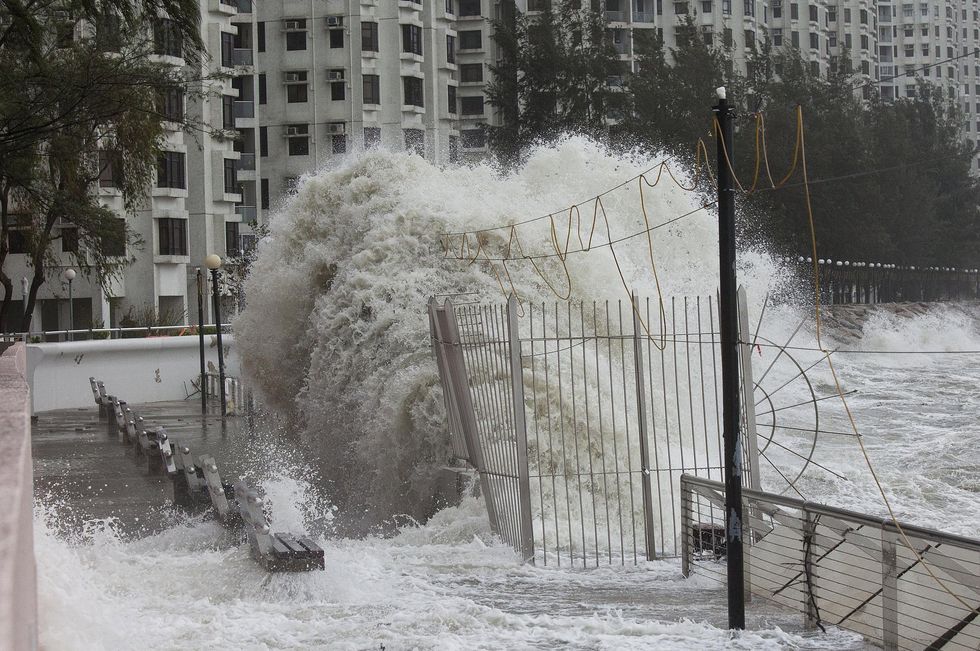 Large waves crash against a sea wall by a housing estate in Heng Fa Chuen during the passing of tropical storm Pakhar, Hong Kong, China, 27 August 2017. Hong Kong and Macau are still reeling from the damage caused by Typhoon Hato which hit the region four days earlier. Picture: