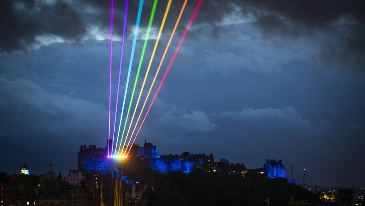 Laser art installation Global Rainbow lights up the Edinburgh skyline