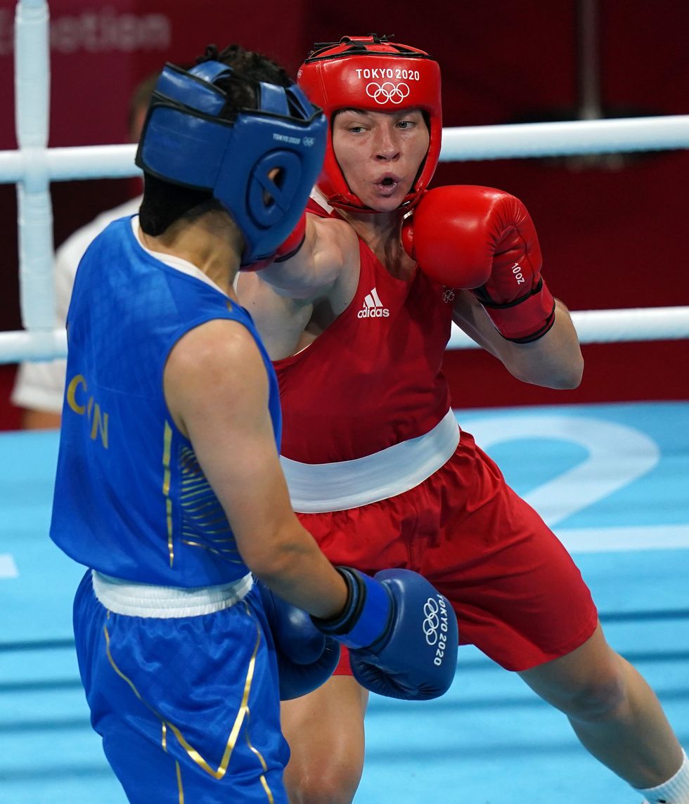 Lauren Price, right, in action against China\u2019s Qian Li (Adam Davy/PA)