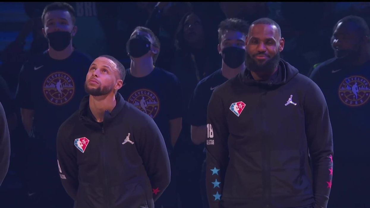 LeBron James almost cracks up during Macy Gray's rendition of US national anthem