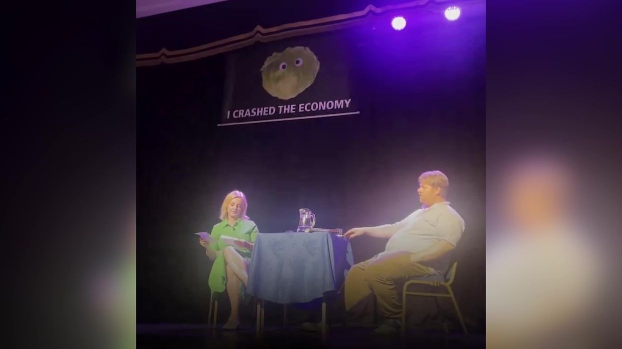 Liz Truss has 3 word response after pro-Trump speech is gatecrashed by lettuce banner