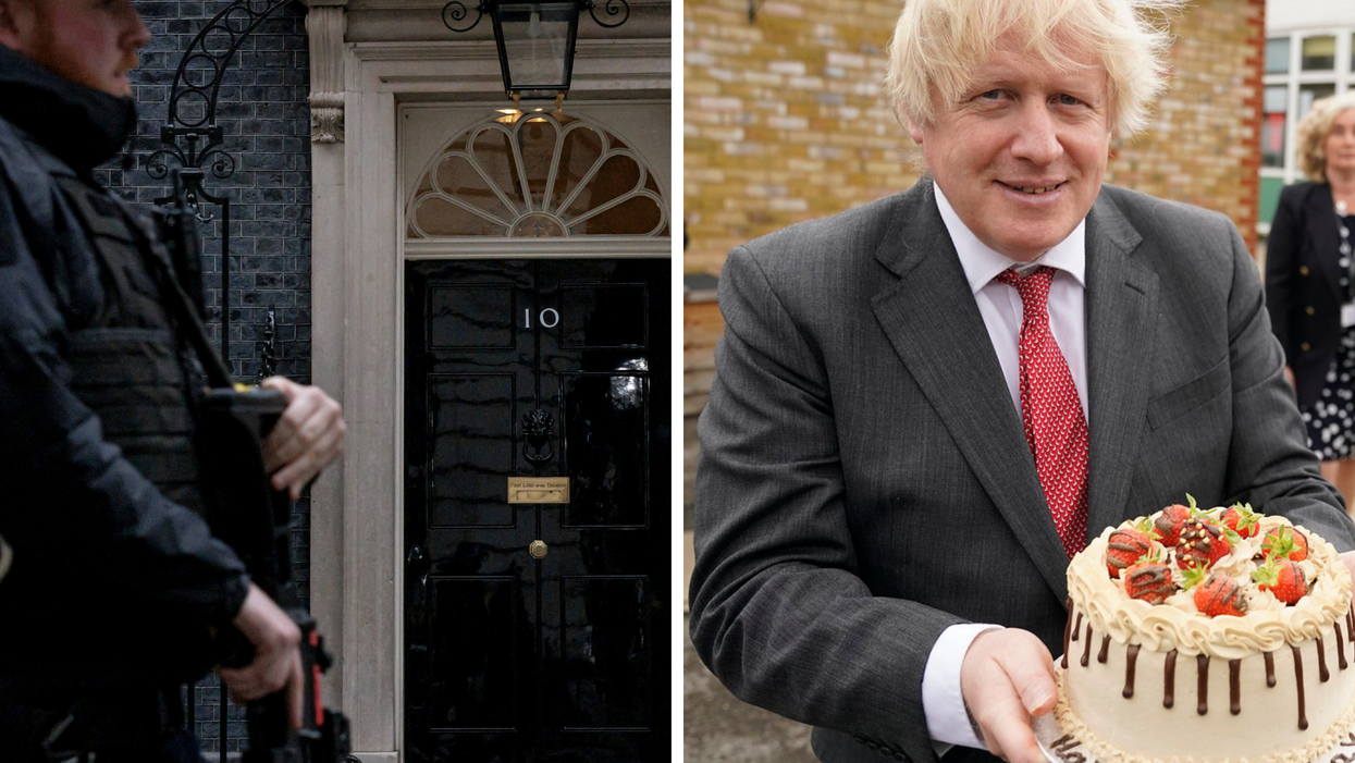 Left, an armed, white male Metropolitan Police officer stands outside Number 10 Downing Street. Right, Boris Johnson, a white man in a black suit, holding a cake with cream icing and strawberries on top.