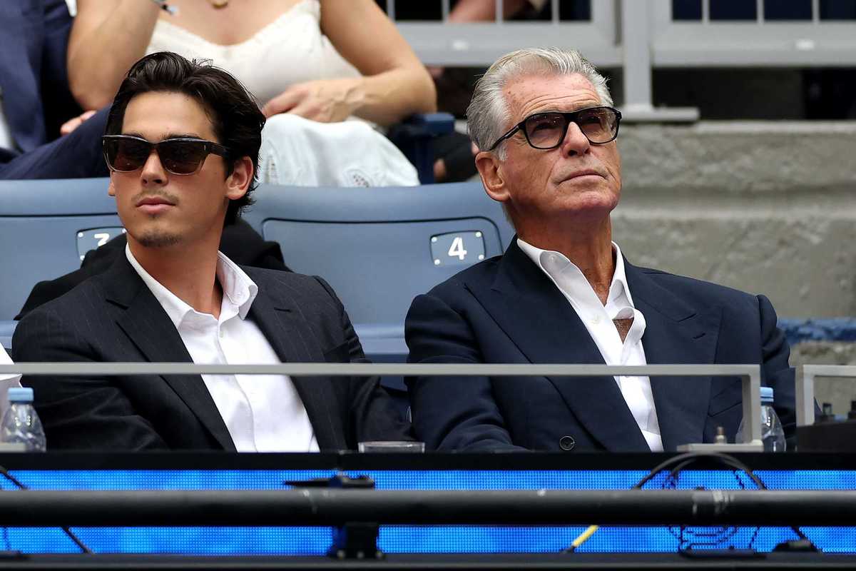 Left, Paris Brosnan, and right, Pierce Brosnan, in the crowd watching the US Open final.