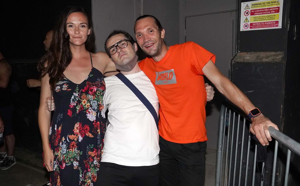 (Left to right) Chloe Waite, Gabriel Wildsmith and Alex Clarke queue up for the Egg nightclub in London