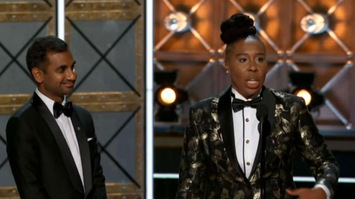 Lena Waithe (R) wins for Outstanding Writing in a Comedy Series, at the 2017 Emmys. Picture: