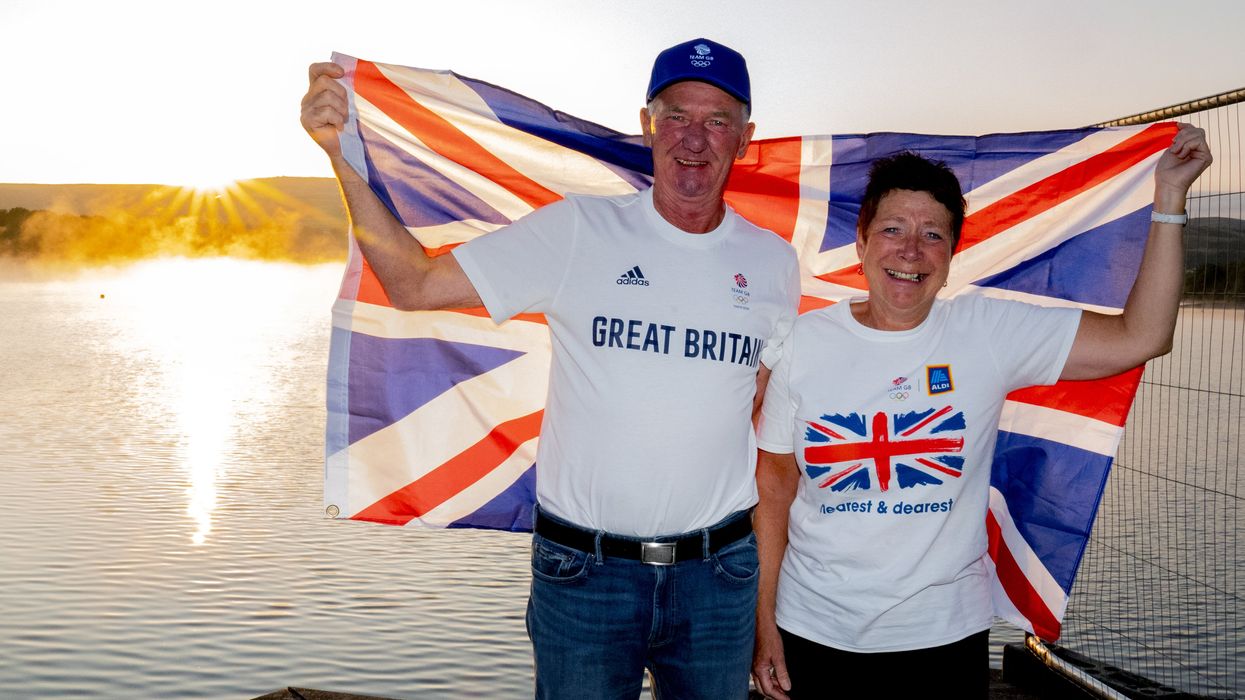 Leslie and Vivian Bithell celebrate after their son Stuart Bithell and his helm Dylan Fletcher won a gold medal in the 49er medal race during the Tokyo 2020 Olympic Games, at Bithell’s home club, Hollingworth Lake Sailing Club, near Rochdale. Picture date: Tuesday August 3, 2021.