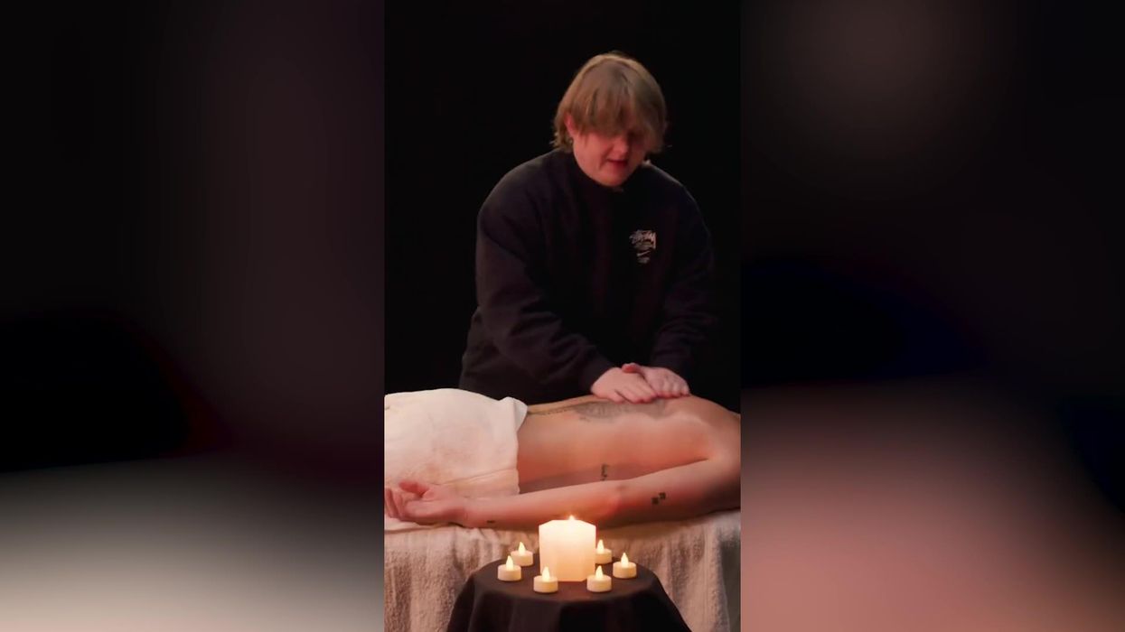 Lewis Capaldi gives Roman Kemp a sensual backstage massage and it's bizarre