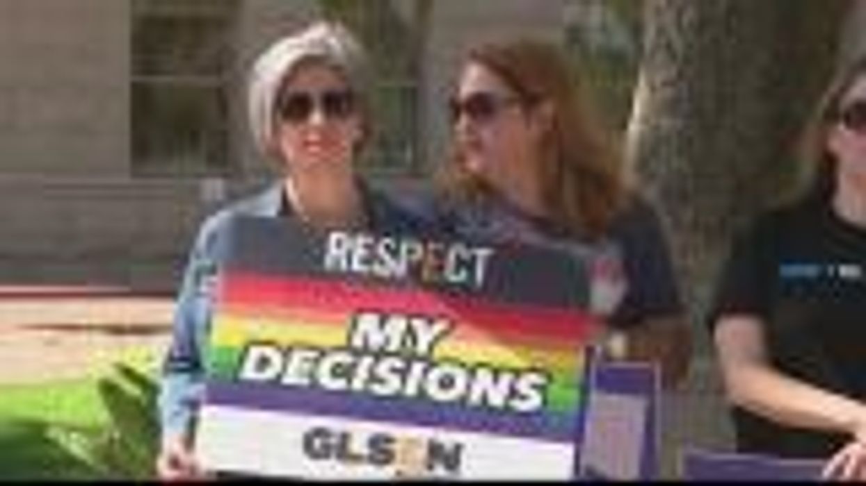 Students protest school's ban on same-sex relationships in an iconic way