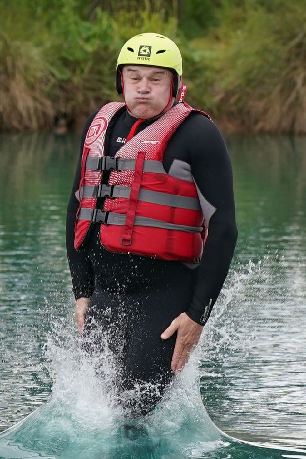 Liberal Democrats leader Sir Ed Davey jumps into the water