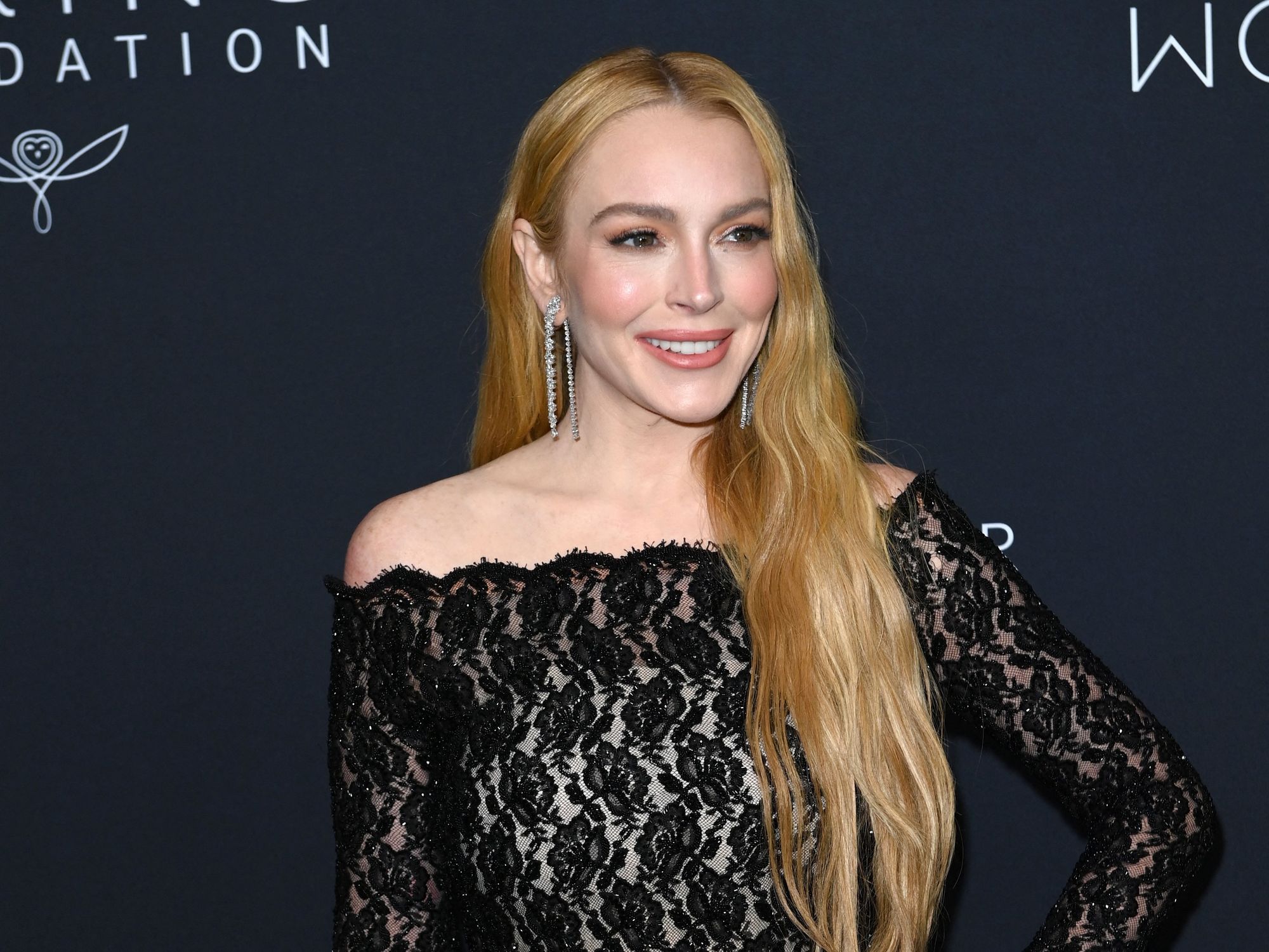 Lindsay Lohan drops major hint as to who is behind viral age-defying new look | indy100 Lindsay Lohan drops major hint as to who is behind viral age-defying new look | indy100