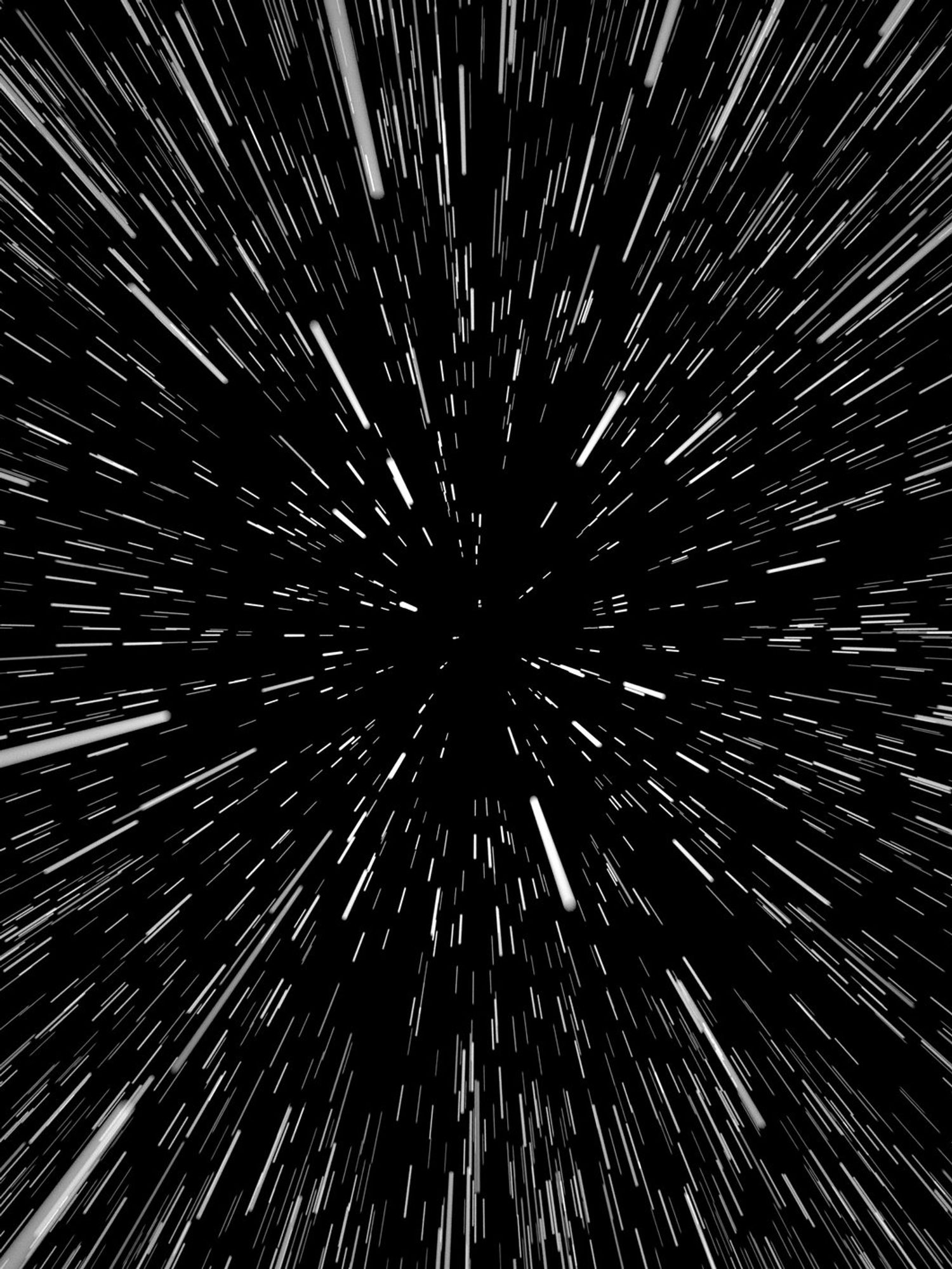 Lines of white light moving in space - lightspeed.