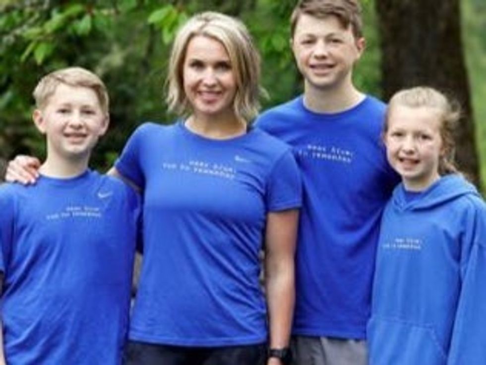 Lisa Hallet, wife of Captain John Hallett and their three children.