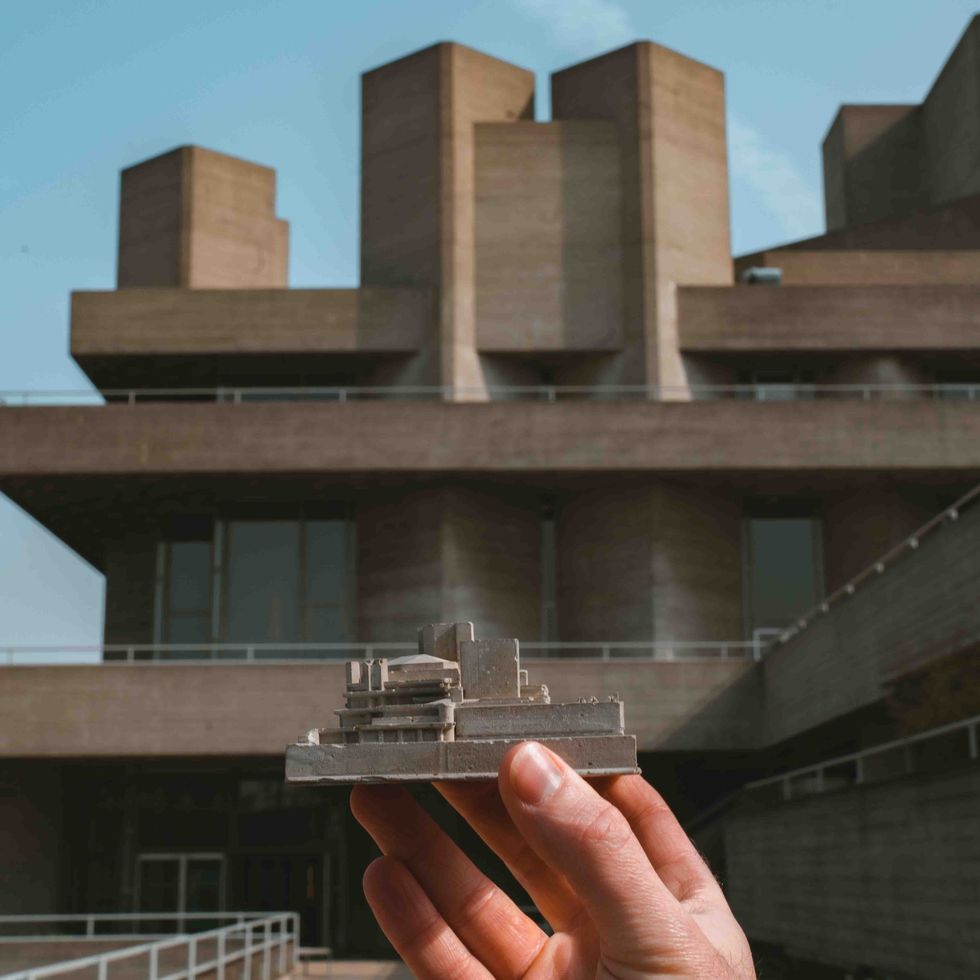 Little building in front of bigger building