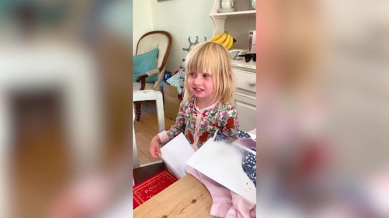 Little girl reacts how we're all thinking finding no money in a birthday card