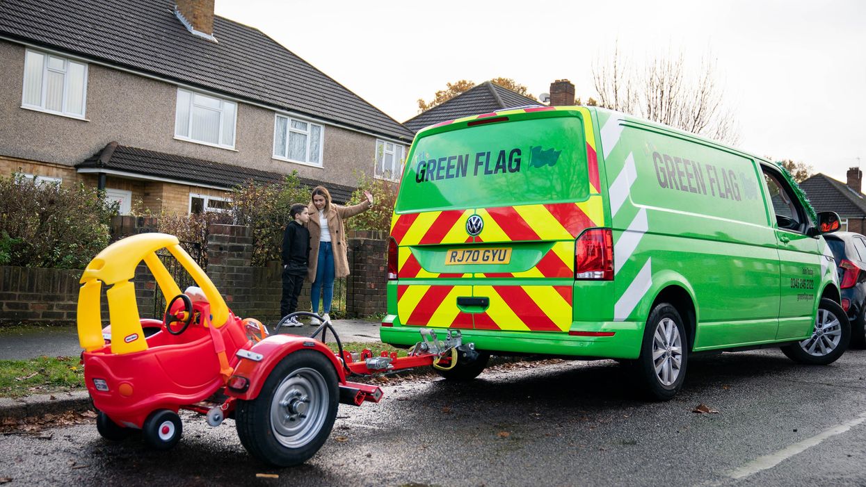 Little Green Flag tows away Noah Montenegro’s used toy car to be recycled (Aaron Chown/PA)