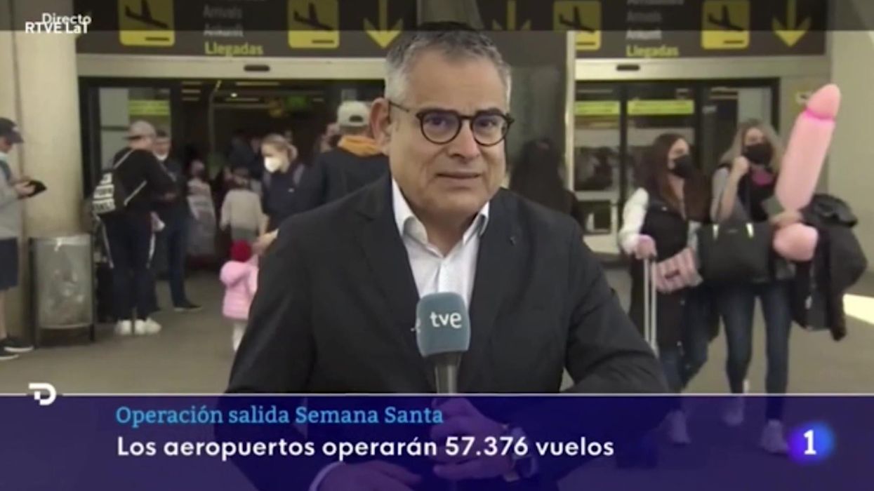 Holidaymaker gatecrashes live TV interview with giant inflatable penis